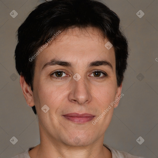 Joyful white adult male with short  brown hair and brown eyes