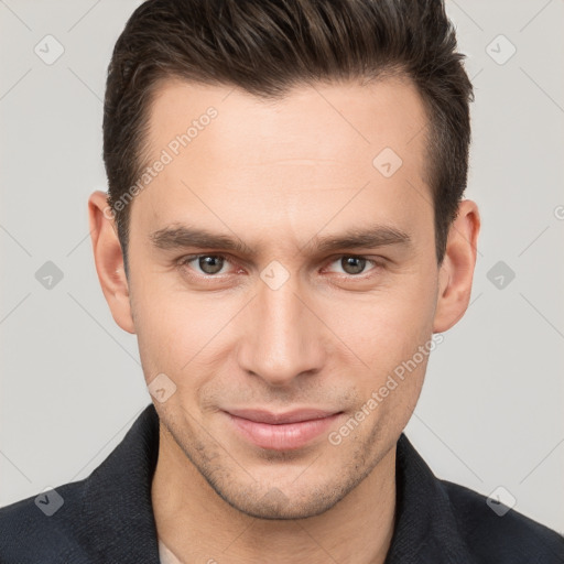 Joyful white young-adult male with short  brown hair and brown eyes