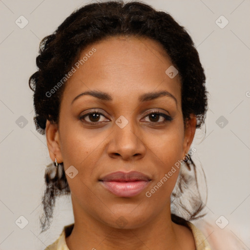 Joyful latino adult female with medium  brown hair and brown eyes