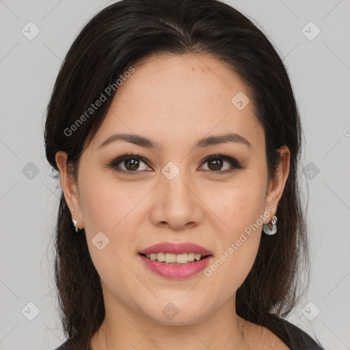 Joyful latino young-adult female with medium  brown hair and brown eyes