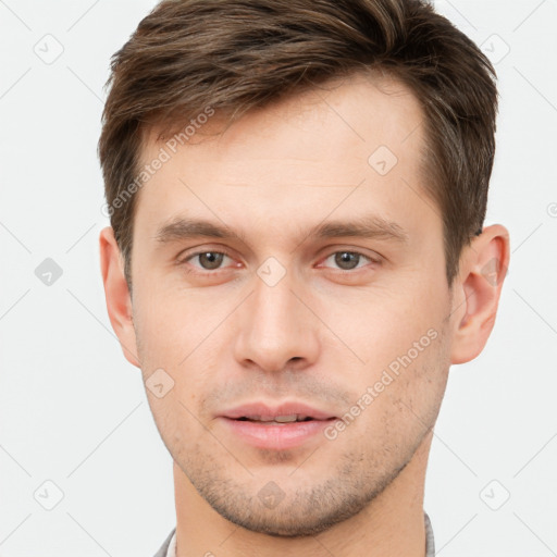 Neutral white young-adult male with short  brown hair and brown eyes