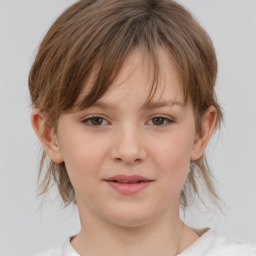 Joyful white child female with medium  brown hair and brown eyes