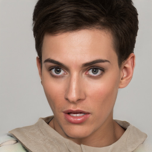 Neutral white young-adult female with short  brown hair and brown eyes