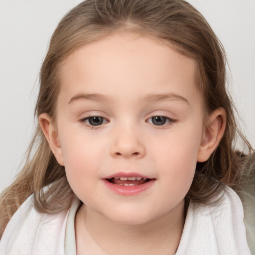 Joyful white child female with medium  brown hair and brown eyes