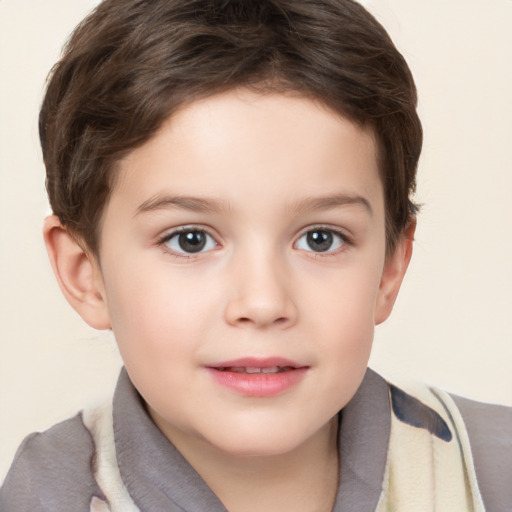 Joyful white child female with short  brown hair and brown eyes