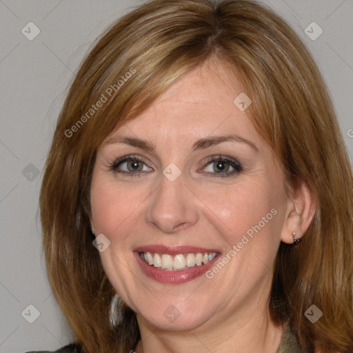 Joyful white adult female with medium  brown hair and brown eyes