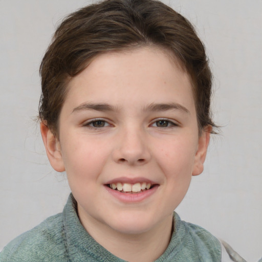 Joyful white child female with short  brown hair and brown eyes