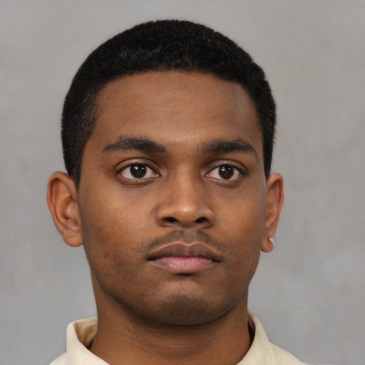 Neutral latino young-adult male with short  brown hair and brown eyes