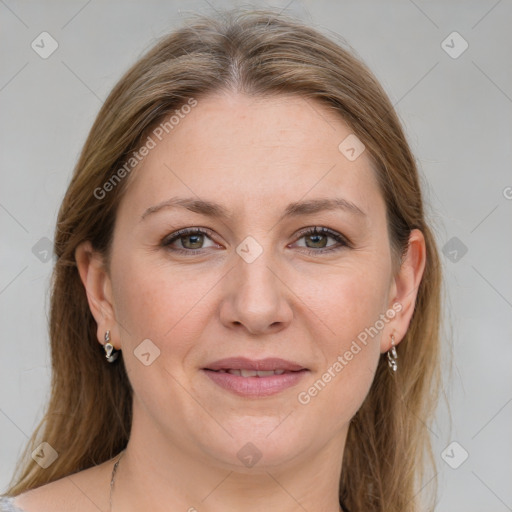 Joyful white adult female with medium  brown hair and grey eyes