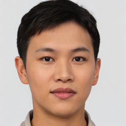 Neutral asian young-adult male with short  brown hair and brown eyes