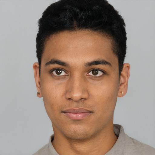 Neutral latino young-adult male with short  black hair and brown eyes