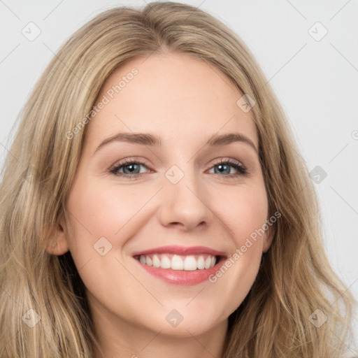 Joyful white young-adult female with long  brown hair and green eyes