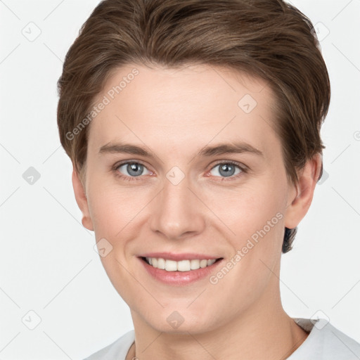 Joyful white young-adult female with short  brown hair and grey eyes