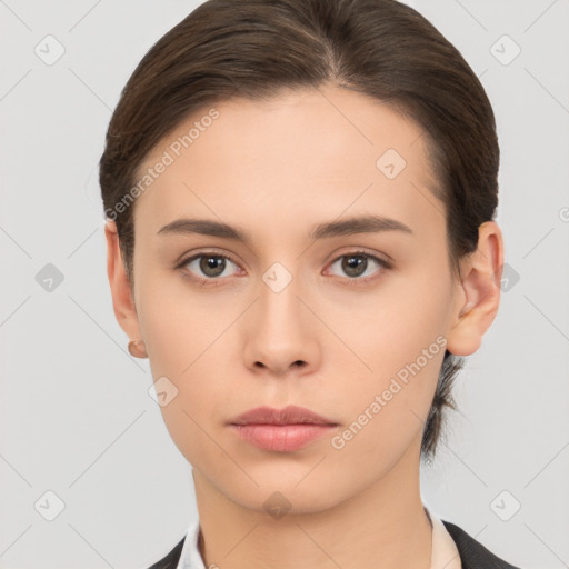 Neutral white young-adult female with medium  brown hair and brown eyes