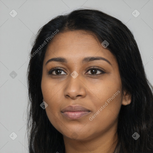 Joyful latino young-adult female with long  black hair and brown eyes