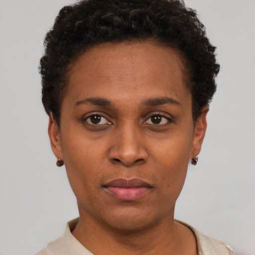 Neutral black young-adult female with short  black hair and brown eyes