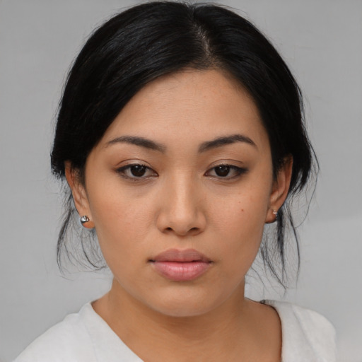 Neutral asian young-adult female with medium  black hair and brown eyes