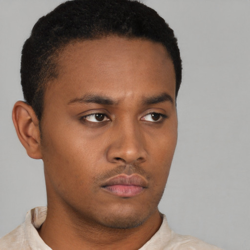 Neutral latino young-adult male with short  brown hair and brown eyes