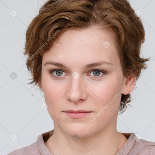 Joyful white young-adult female with medium  brown hair and blue eyes