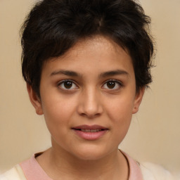 Joyful white child female with short  brown hair and brown eyes