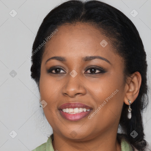 Joyful latino young-adult female with long  black hair and brown eyes