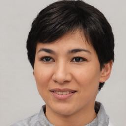 Joyful asian young-adult female with short  black hair and brown eyes