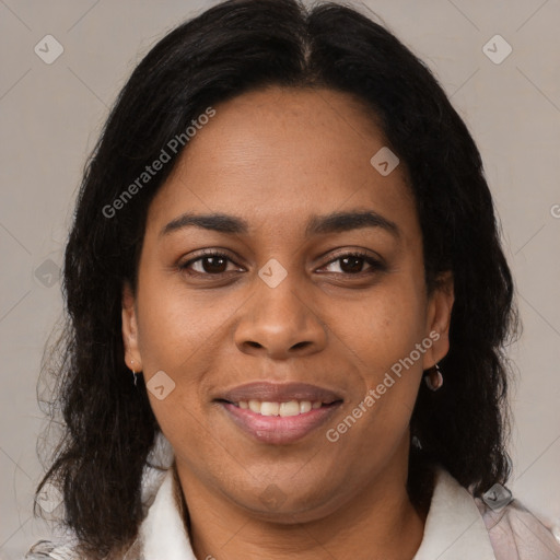 Joyful latino young-adult female with medium  brown hair and brown eyes