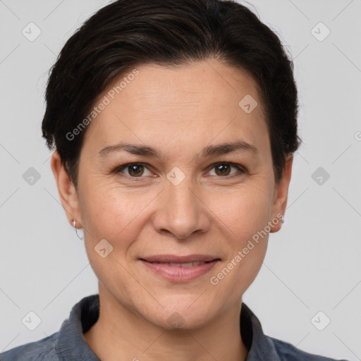 Joyful white adult female with short  brown hair and brown eyes