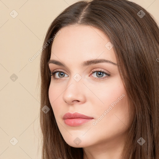 Neutral white young-adult female with long  brown hair and brown eyes