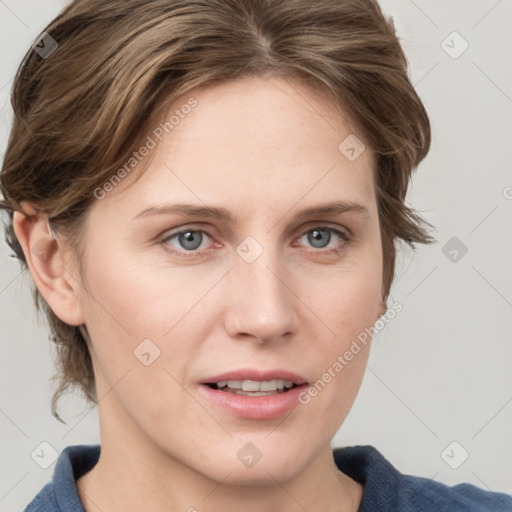 Joyful white young-adult female with medium  brown hair and blue eyes