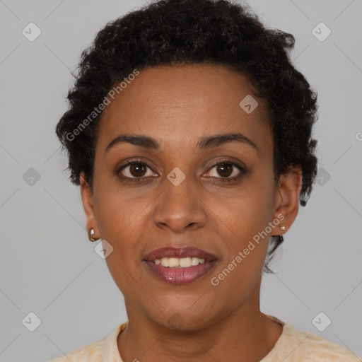 Joyful black young-adult female with short  brown hair and brown eyes