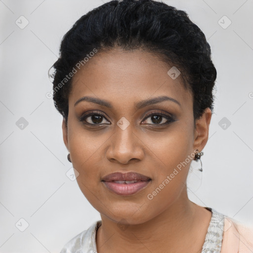 Joyful black young-adult female with short  black hair and brown eyes