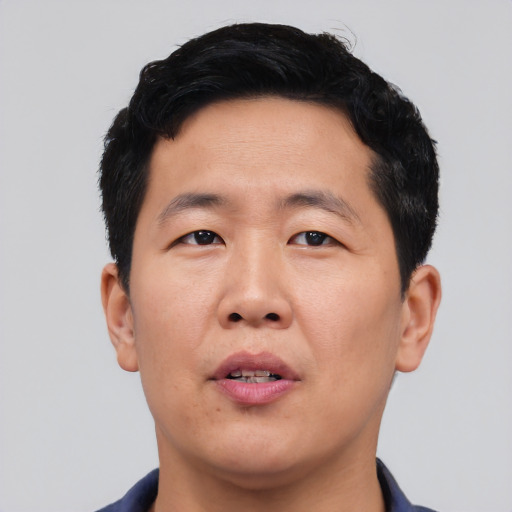 Neutral asian young-adult male with short  black hair and brown eyes