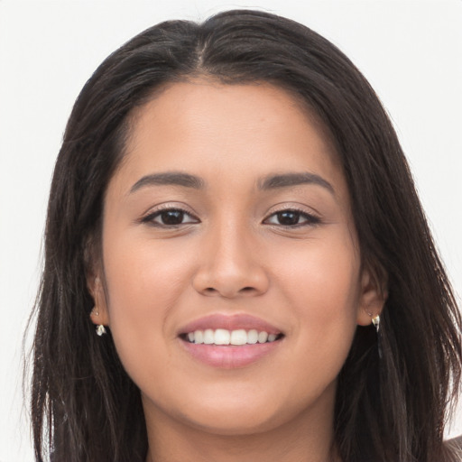 Joyful white young-adult female with long  brown hair and brown eyes