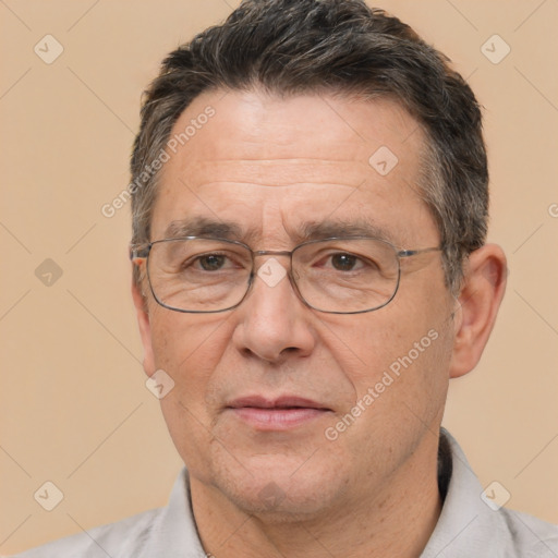 Joyful white middle-aged male with short  brown hair and brown eyes