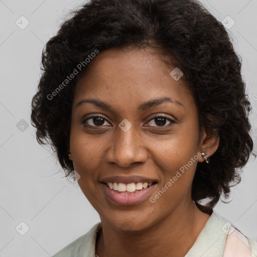 Joyful black young-adult female with long  brown hair and brown eyes