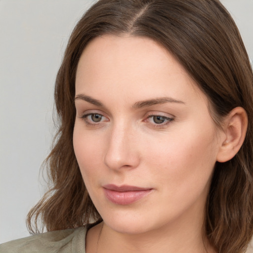 Neutral white young-adult female with medium  brown hair and grey eyes