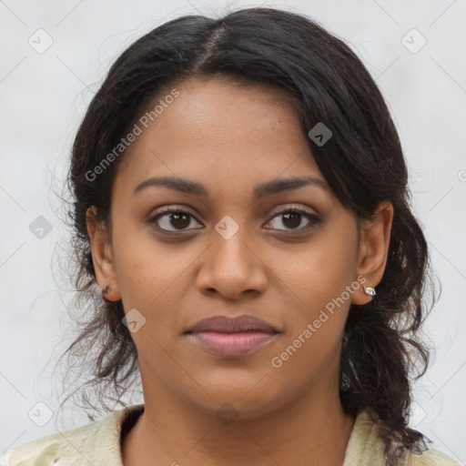 Joyful latino young-adult female with medium  brown hair and brown eyes