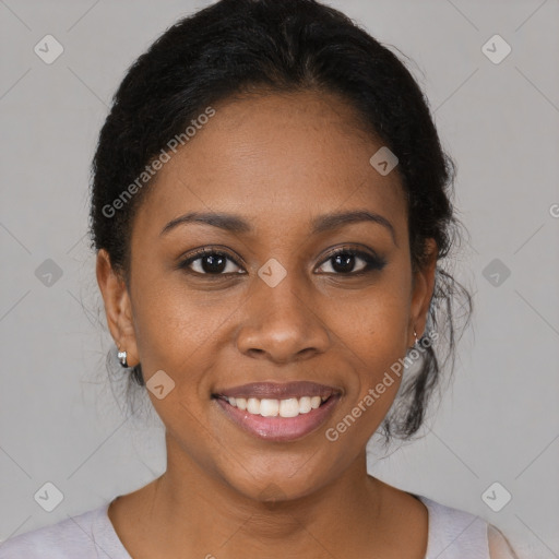 Joyful black young-adult female with medium  brown hair and brown eyes