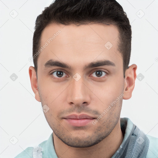 Neutral white young-adult male with short  brown hair and brown eyes