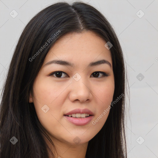 Joyful asian young-adult female with long  brown hair and brown eyes