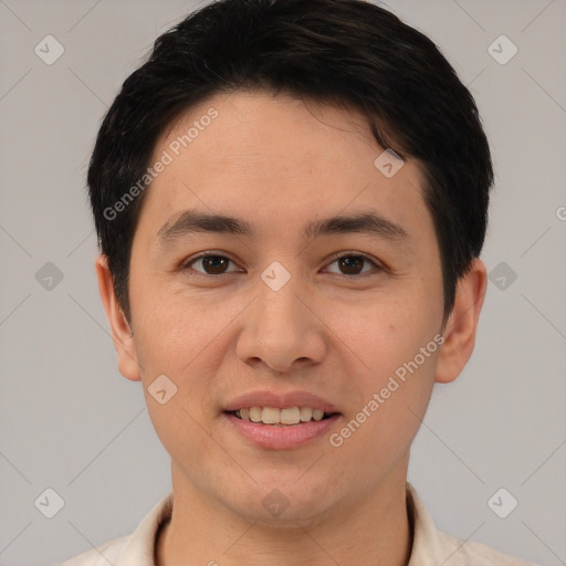 Joyful asian young-adult male with short  brown hair and brown eyes