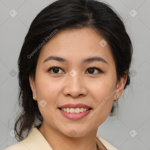 Joyful asian young-adult female with medium  brown hair and brown eyes