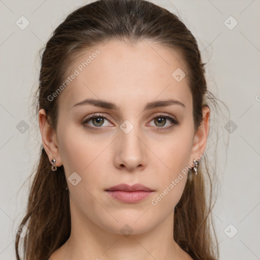 Neutral white young-adult female with long  brown hair and green eyes