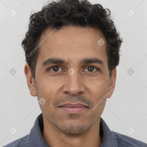 Neutral white adult male with short  black hair and brown eyes