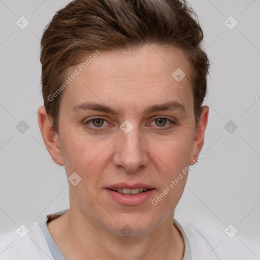 Joyful white young-adult female with short  brown hair and grey eyes