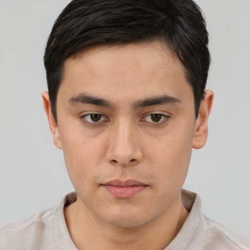 Neutral asian young-adult male with short  brown hair and brown eyes