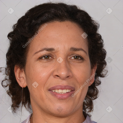 Joyful black adult female with medium  brown hair and brown eyes