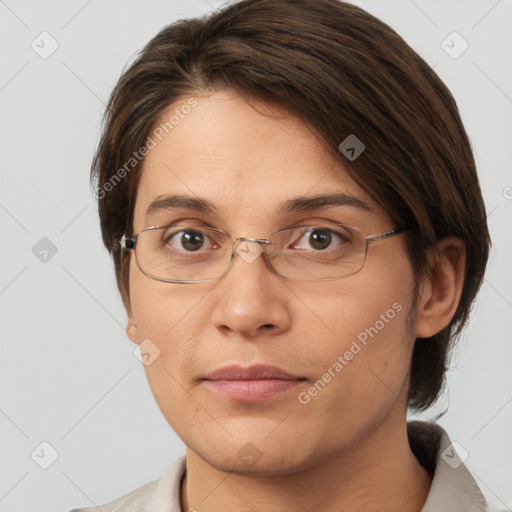 Joyful white adult female with medium  brown hair and brown eyes