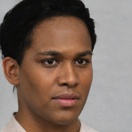 Neutral black young-adult male with short  brown hair and brown eyes
